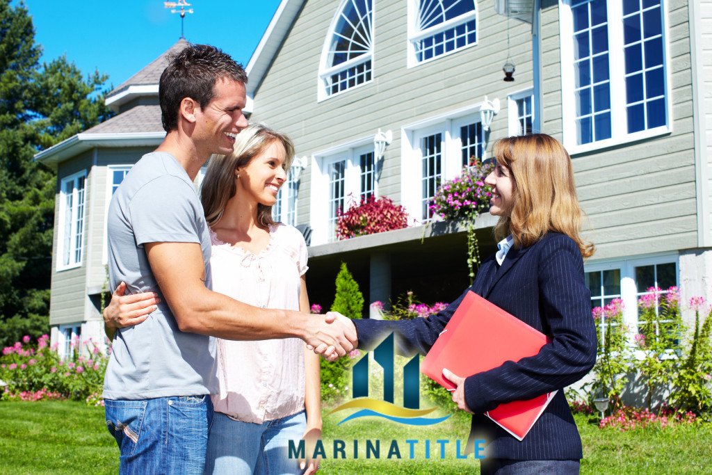 Real estate agent with clients