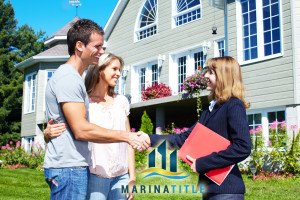 Real estate agent with clients