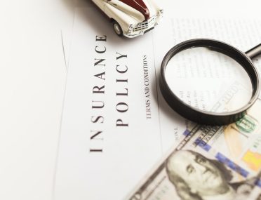 a magnifying glass sitting on top of a piece of paper